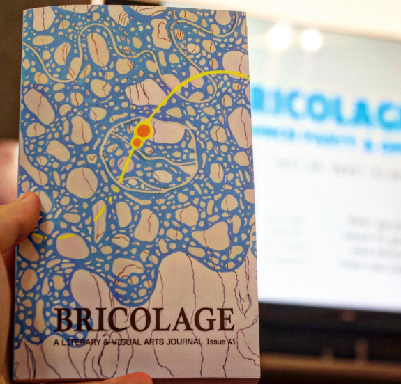 Bricolage cover with blue drawing with orange marks