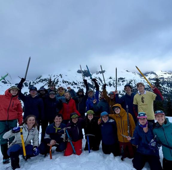 Group of students in snow with gear