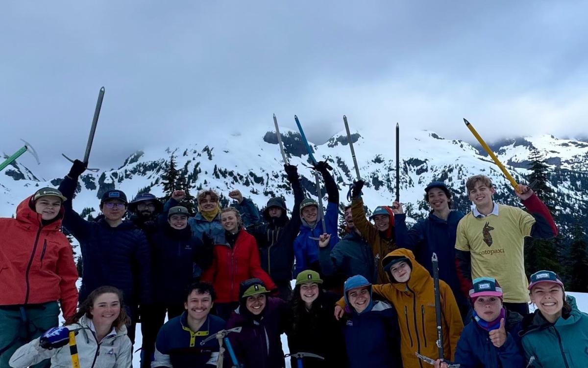 Group of students in snow with gear