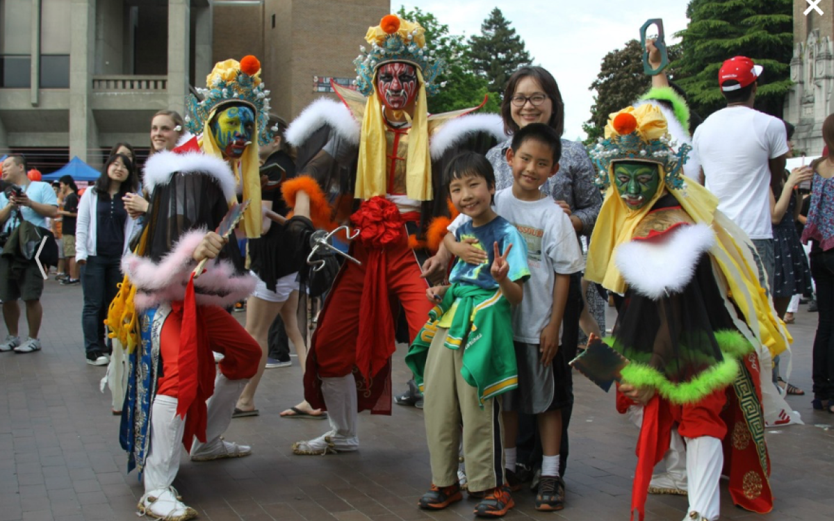 Performers and kids at TSA night market