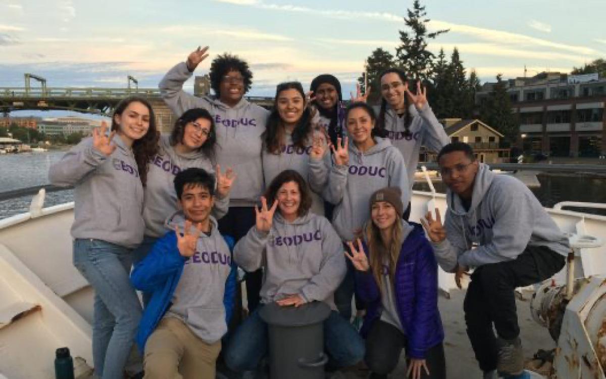 Group of atmospheric science students waving 