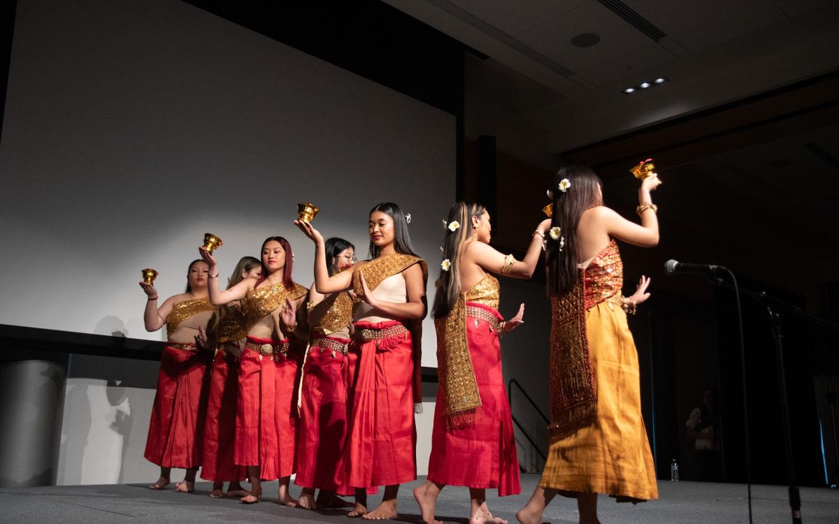 Women in traditional costumes dancing 