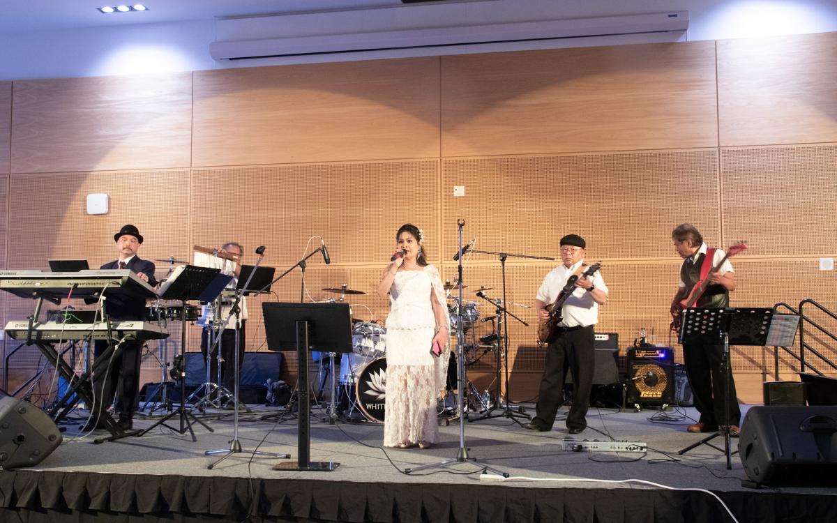 Woman singing on stage