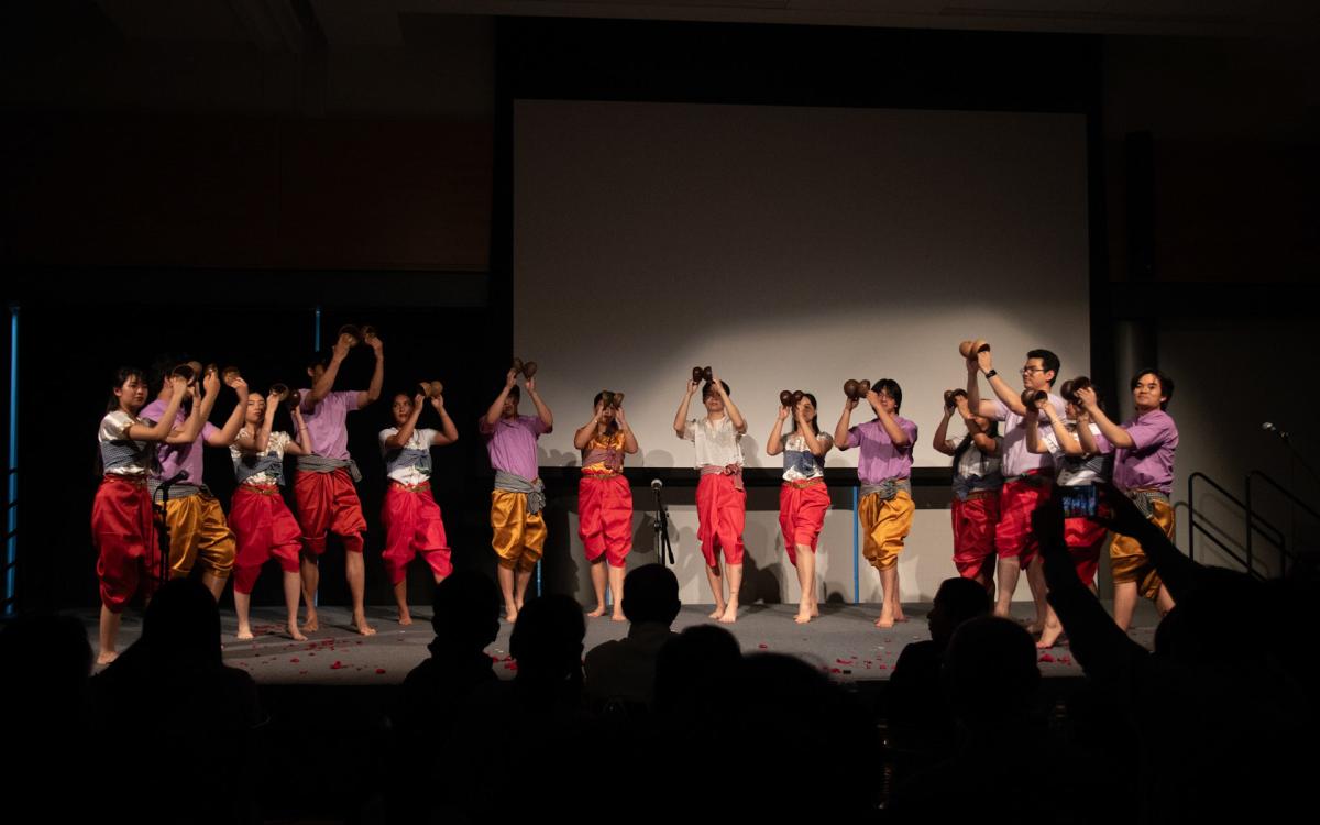 Group in traditional costumes performing 