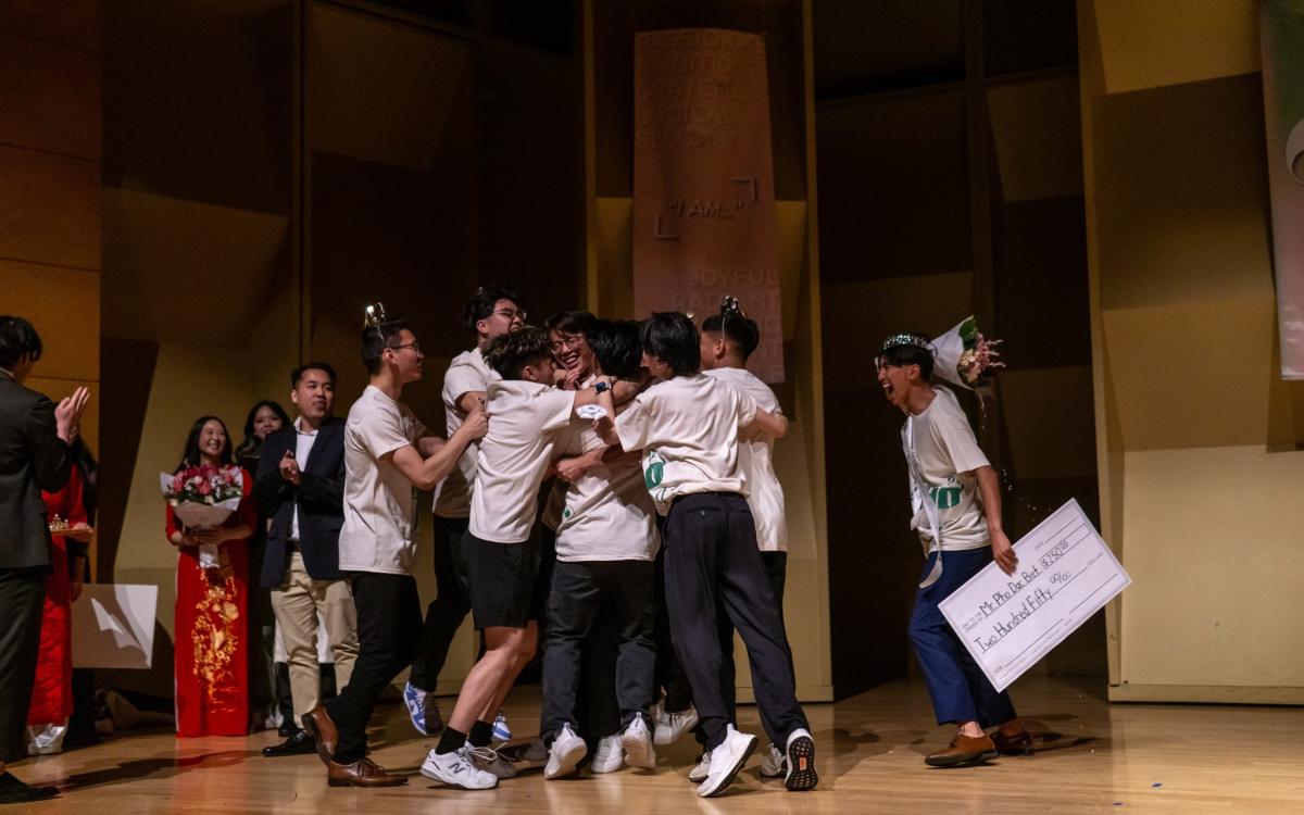 Phở King contestants embracing winner of the pageant.