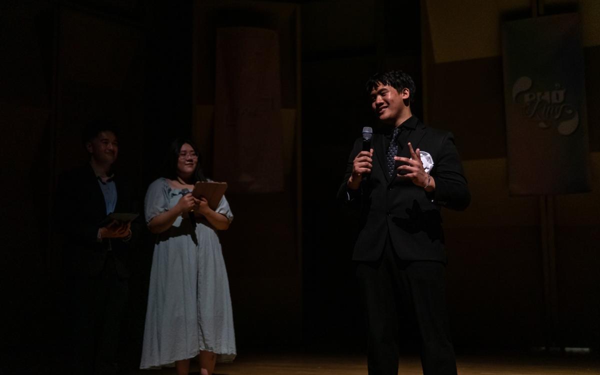 Phở King contest answering reflective questions about his identity and journey in preparing for the show.