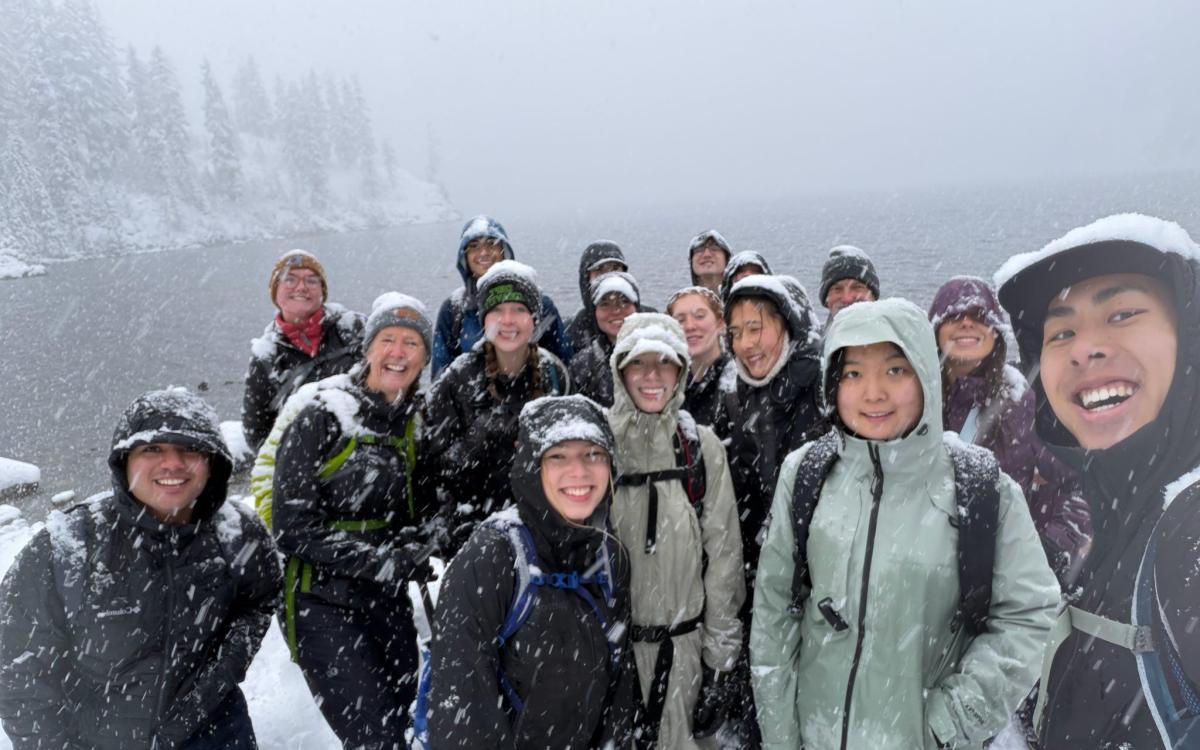 Hikers and professors on an aptly named snowy hike to Snow Lake.