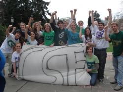 Group of folks standing with CSF sign